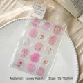 3D wax seal style resin stickers with pink butterfly and floral motifs on white tray - Warm Pink Sunset