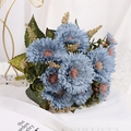 Artificial bouquet of blue sunflowers and green leaves on a white background - Blue