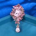 Elegant gold brooch featuring emerald-cut pink crystal and pear-shaped drop pendant - XD7665-3-Gold Pink Emerald Cut
