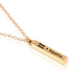 Macro shot of rose gold rectangular bar pendant with Aquarius zodiac engraving - Gold Aquarius