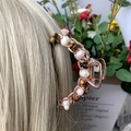 Gold hair claw clip with elegant pearls and brown tiger eye stones on blonde hair - Tiger Eye + Deep Sea Pearl Rose Gold Hair Claw