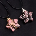 30mm natural star-shaped crystal pendant wrapped in gold and silver wire with black cord - Rhodonite