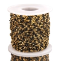 Golden stainless steel cross chain with black enamel beads on a white plastic spool - Gold-Black