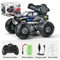 Blue shark-themed 4x4 RC monster truck set with remote, battery, and USB cable - SL058 Black Blue Pickup Water Shooting Style