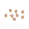 Detailed view of seven 6mm gold stainless steel pendants with pink birthstone zircon - 5 Pcs / 4g / Gold/Pink Zirconia