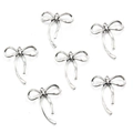 Detailed view of six silver alloy hollow bow pendants for DIY jewelry making and crafts - No. 17 Bowknot-Silver-20*25mm