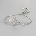 Adjustable silver flower bracelet with zircon stones and box chain detail - Platinum White Zirconia