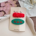 Set of two fabric hair clips featuring red ruffles and green cherry embroidery on card - Dark Green