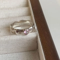 Silver wavy open ring with pink heart-shaped zircon gemstone in a jewelry box - Wavy Pink Heart Shiny Ring (J2969)