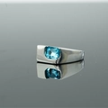 Polished silver ring featuring a rectangular blue zircon stone in a wide band design - US 7 / Silver Tone/Light Blue Zirconia