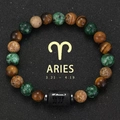 Close-up of Aries zodiac bracelet with natural tiger eye and green stone beads - Aries