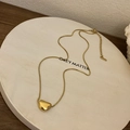 Minimalist gold bean pendant necklace with square box chain on display tray - Gold Bean Style (Titanium Steel)