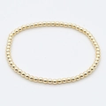 Polished golden beaded bracelet with uniform metallic spheres and a sleek minimalist style - Plain Gold Beads
