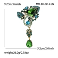 Spilla a goccia vintage con strass verdi e cristalli blu su base in lega dorata - Verde