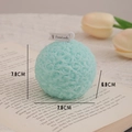 Cyan ball-shaped rose embossed scented candle with a white cotton wick and tag - Macaron Lake Green Floral Ball (Blackberry & Basil)