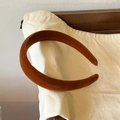 Macro shot of high-crown velvet headband in warm caramel brown with soft plush texture - Padded Headband / Lazy Pumpkin Orange