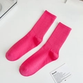 Vibrant rose red crew socks with elastic ribbed knit texture for a sporty comfort look - One Size / Peach Pink