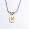 Goldener M-Buchstabenanhänger an silberner Schlangenkette mit Zirkonia-Einlagen - Buchstabe M