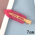 Close-up of a 7cm rose pink marble acetate hair clip with golden metal duckbill base - 4# Acetate 7cm Seamless Clip
