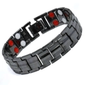 Poliertes schwarzes Magnettherapie Armband mit roten und weißen Einsätzen - Rot-Weiß-Schwarz-Magnetstein in Anthrazit