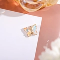 Iridescent butterfly pendant with golden metal base and white zircon accents - AB Color