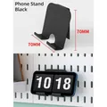 Matte black phone holder with L-shaped design and charging hole for pegboard storage - Phone Stand - Black