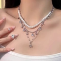 Layered faux pearl necklace with silver star and heart pendant for a trendy chic style - Pearl Star Pendant Necklace X3604