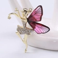 Eleganter Ballerina-Brosche in Gold mit roten Flügeln und funkelnden Strasssteinen - Lila