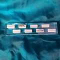 Transparent acrylic ring display stand with eight white slots on blue silk fabric - 8 Slots Clear Base White Velvet 20*4.5CM