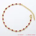 Detail view of 4mm red rhinestone bezel-set chain with 185mm length and lobster clasp - Bracelet / Gold / Rose Red Zirconia