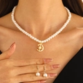 Elegant white faux pearl necklace and earring set with gold moon charms and small crystals - KC Gold (11989)