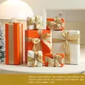 7-piece set of orange and white Christmas gift boxes with gold bows for holiday decor - Orange & White Series 7-Piece Set
