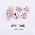 Macro detail of 12x12mm purple heart flower nail gems with gold metal base - Five-Petal Flower Starry Pink Style (9105)