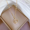 Elegante Halskette aus Titan mit Goldmond, Herz und funkelnden weißen Zirkonia auf Seide - Gold (Titanium Stahlkette Kupferanhänger)