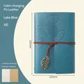 A6 lake blue PU leather notebook featuring embossed leaf pattern and leaf pendant cord - Lined / Lake Blue / A6