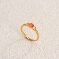 Titanium steel ring in gold with sunset orange and yellow three-stone gems - Gold + Yellow Diamond