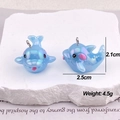 Macro view of blue iridescent dolphin pendants for DIY jewelry with dimensions and weight - AB Colorful Blue Dolphin