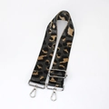 Close-up of leopard print bag strap with silver metal lobster clasps and adjustable buckle - Grey With Silver Buckle