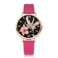 Macro detail of women's quartz watch featuring floral dial and rose gold metal case - Watch Only / Rose Red