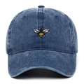Washed navy denim baseball cap with yellow bee embroidery and vintage distressed finish - Navy Blue