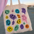 Retro canvas tote bag in ivory with colorful melting smiley face glitter print - STD874-O Melting Smiley Faces