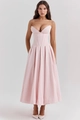 Detail of light pink strapless midi dress featuring boned waist and pleated flowy hem - S / Pink
