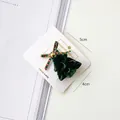 Green velvet Christmas tree hair clip with striped bow and bell for holiday styling - Green Bell Christmas Tree Hair Clip