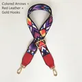 Detail of colorful geometric arrow woven strap with red leather ends and gold metal hooks - Colorful Arrow Red Leather Gold Hook
