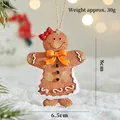 Gingerbread woman Christmas tree ornament with red bow, resin holiday decor, 8x6.5cm - Style F