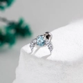 Silver crescent moon cartilage stud with light blue zircon and clear stones - Light Sea Blue (Single Piece)