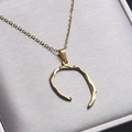 Golden stainless steel necklace with textured irregular horseshoe pendant - Pendant Necklace / Gold