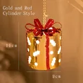Addobbo natalizio a scatola regalo cilindrica oro e rossa con fiocco rosa e altezza 11cm - Cilindro Oro e Rosso