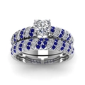 Braided silver ring set with heart-cut white stone and blue sapphire accents - US 7 / Silver/Blue Zirconia
