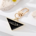 Portachiavi a triangolo dorato con smalto nero e scritte su pietra decorativa - Triangolo in Smalto Nero